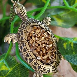 Intricately Cut Brass Sea Turtle Pendant With Gold Stones